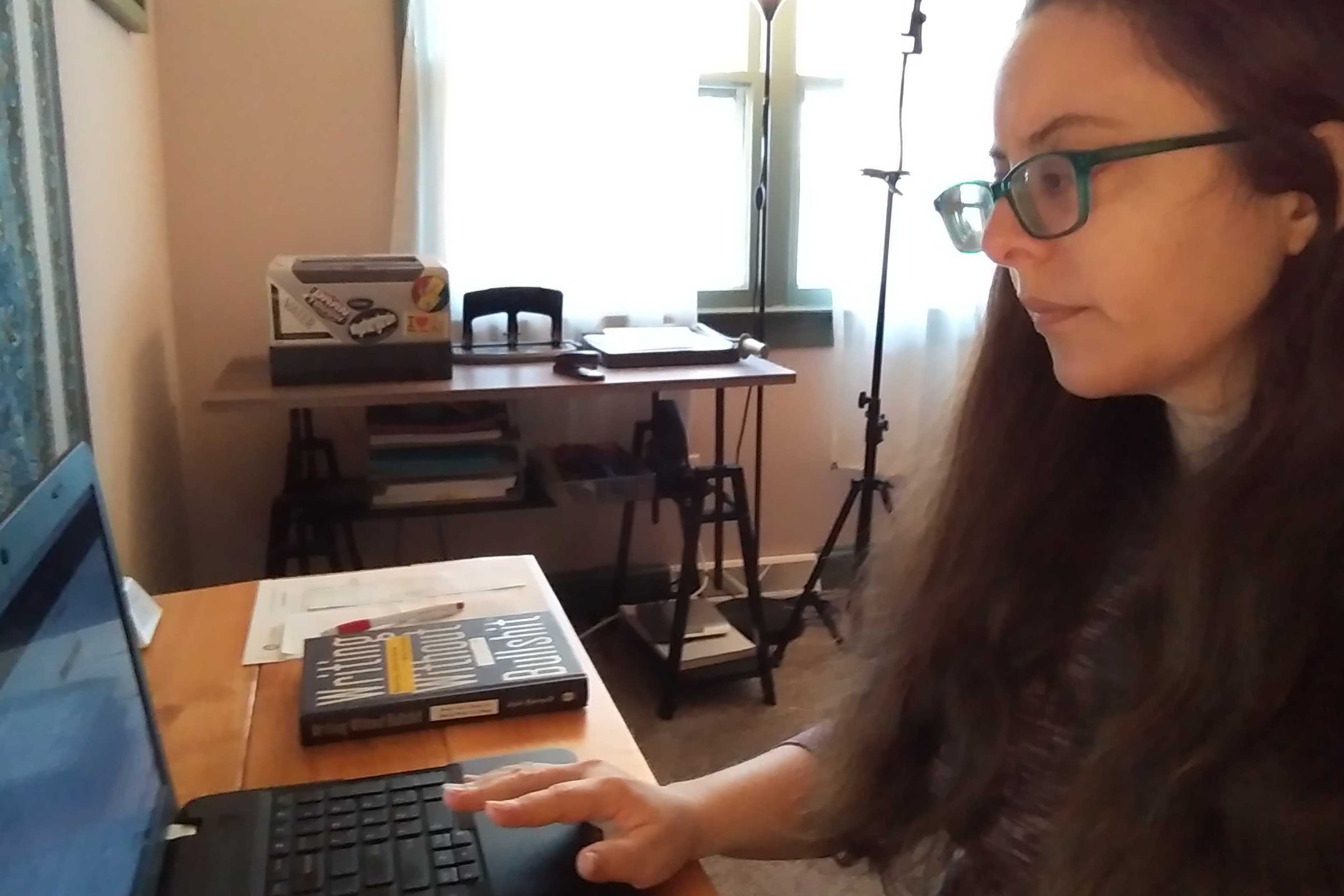 Gina Misra sitting in front of her laptop during a tutorial session